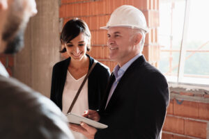 group of roofing inspectors reviewing roofing insurance claims